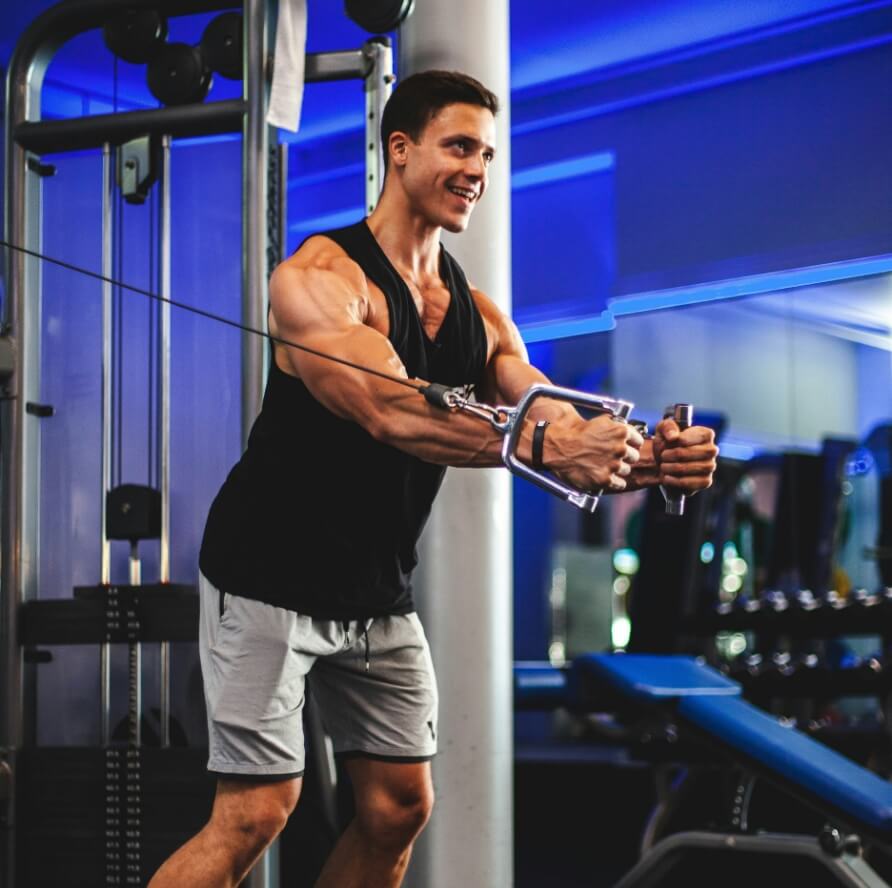 Athlete training with the cable machine